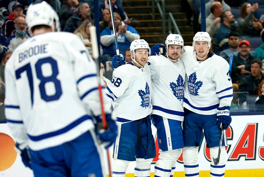 Maple Leafs' Auston Matthews is congratulated by his teammates after scoring a goal during the first period against the Columbus Blue Jackets at Nationwide Arena on March 7, 2022 in Columbus, Ohio.