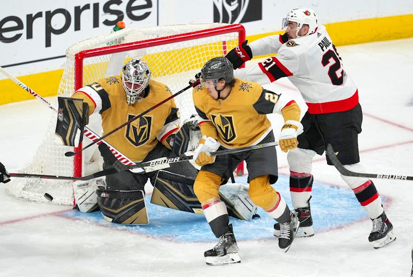 Vegas Golden Knights goaltender Robin Lehner and defenseman Zach Whitecloud defend the net as Ottawa Senators winger Nick Paul (21) attempts to deflect the puck on Sunday at T-Mobile Arena. TSN Insider Darren Dreger believes talks with Paul and the Senators are continuing and remains hopeful the two sides will be able to get a deal done.