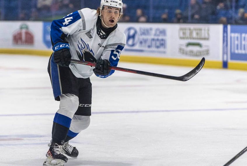 Calgary Flames prospect Jeremie Poirier is leaving his mark with the QMJHL's Saint John Sea Dogs. He recently erased the franchise record for most career points by a defenceman. (Photo by Mike Hawkins/Courtesy of Saint John Sea Dogs)