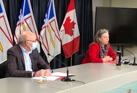 Chief Medical Officer of Health Dr. Janice Fitzgerald speaks with media Wednesday, March 9, during what's expected to be the last routine COVID-19 briefing for the province, as Health Minister Dr. John Haggie looks on.