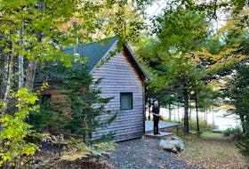 Julie Perkins' partner, Brian Fay, enjoys the peaceful late-summer ambience at their off-grid cabin in Annapolis County.