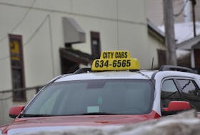 Taxi companies in Corner Brook are looking to add a $2 fuel surcharge to their rates when gas prices go above $1.65 a litre.