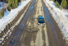 A vehicle captured in video footage from a drone taken by Alex Bailey shows a vehicle driving on the wrong side of the road to avoid the potholes on Route 414 on the Baie Verte Peninsula.