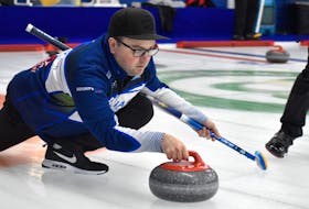Travis Stone of the Sydney Curling Club focuses on his shot during Mercer Fuels Cash Spiel game action at the Sydney Curling Club on Friday. Stone's team lost out to eventual winner Brent MacDougall, a former Sydney resident who now resides in Halifax. JEREMY FRASER/CAPE BRETON POST