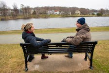 Monique Mullins-Roberts, coordinator for the Dartmouth Community Health Board, and Mike Vlahos, co-chair of the health board, talk on a bench near Sullivan's Pond in Dartmouth on Friday, April 8, 2022. Dartmouth will soon be getting happy to chat benches which will encourage people to connect with others in the community.
Ryan Taplin - The Chronicle Herald