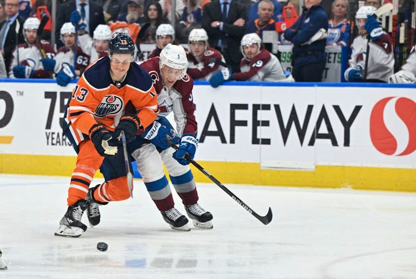 xEdmonton Oilers right winger Jesse Puljujarvi (13) is seen out on the ice  with Colorado Avalanche  defenceman Jack Johnson (3)  as the Edmonton Oilers took on the on the Colorado Avalanche during the first period at Rogers Place on April 9, 2022. 