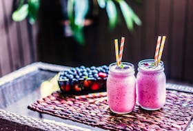 Smoothies are an excellent way to use frozen fruits. - Storyblocks