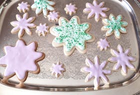 In the photo at left are the cookies before decorating, and the photo at right shows them flooded with royal icing. Sprinkles were added while the icing was wet. 