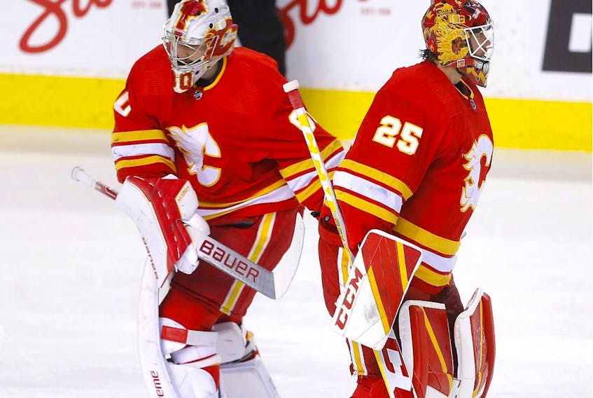  Calgary Flames goalie Jacob Markstrom is replaced with Dan Vladar after Vegas Golden Knights third goal in second period NHL action at the Scotiabank Saddledome in Calgary on Thursday, April 14, 2022.