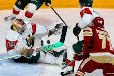 Halifax Mooseheads  goalie Mathis Rousseau makes a stop on a shot by Acadie-Bathurst Titan Nolan Forster during QMJHL action in Halifax Tuesday April 12, 2022.

TIM KROCHAK PHOTO
