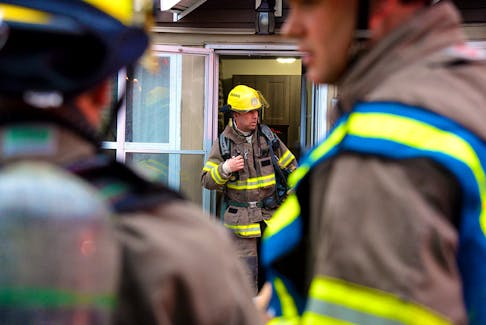 A basement fire forced the evacuation of a row of seven homes in downtown St. John's Monday morning. Keith Gosse/The Telegram