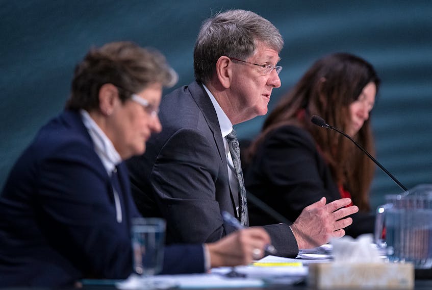 Michael MacDonald, chair, flanked by fellow commissioners Leanne Fitch, left, and Kim Stanton, responds to lawyers representing some family members, at the Mass Casualty Commission inquiry into the mass murders in rural Nova Scotia on April 18/19, 2020, in Halifax on Wednesday, March 2, 2022. THE CANADIAN PRESS/Andrew Vaughan
Pool photos use is permitted. Mike H