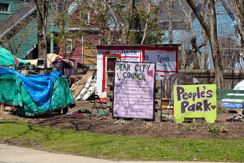 New signage, put up by residents at Meagher Park, in a plea to Halifax City Council.ERIC WYNNE/Chronicle Herald