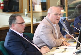 District 8 Coun. James Edwards, right, shown with District 7 Coun. Steve Parsons: "I’m not denying the five per cent (tax-rate decrease; I’m wondering if there was a more (fiscally) responsible way of doing this," Edwards said. IAN NATHANSON/CAPE BRETON POST