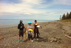 Walking the beach often results in collecting a fair amount of garbage that’s been brought in by the Bay of Fundy tides.