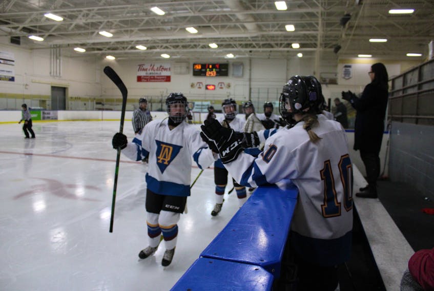 The Dalbrae Dragons celebrate after scoring a goal during the School Sport Nova Scotia Division 2 girls' hockey provincial championships at the East Hants Sportsplex on Friday. Dalbrae has a 2-0 record to begin the tournament. PHOTO CONTRIBUTED/PATRICK HEALEY.