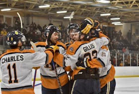 Sam Gillis is all smiles as he celebrates, with his teammates, a goal he scored in the second period of Game 5 in the Mariners playoff series with the Valley Wildcats. The Mariners needed to win this game to push the series to a Game 6. They did do with a 4-1 home win. TINA COMEAU PHOTO