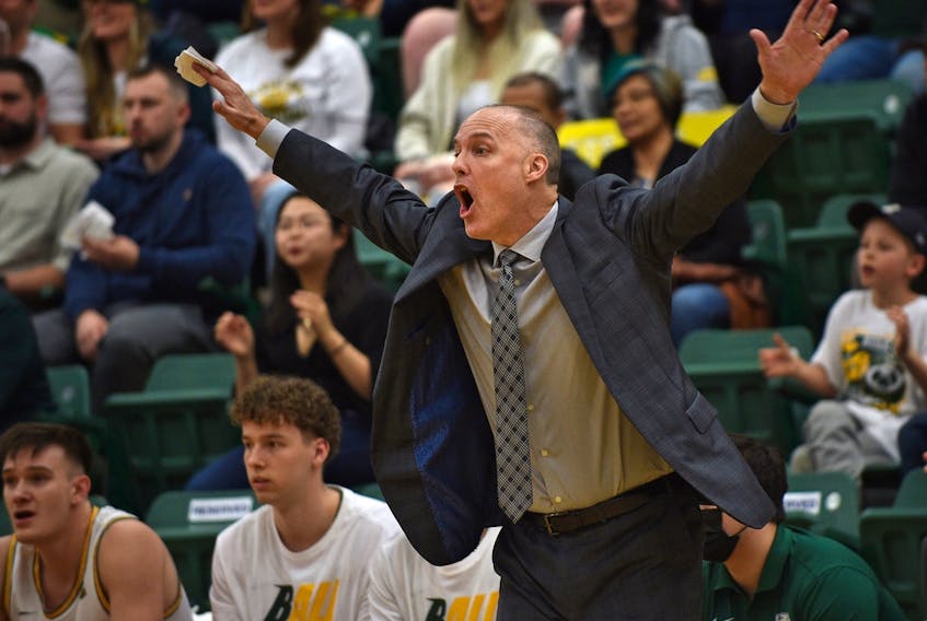  University of Alberta Golden Bears head coach Barnaby Craddock reacts during a quarter-final game against the McGill University Redbirds in the 2022 U Sports Final Eight tournament at the Saville Community Sports Centre in Edmonton on Friday, April 1, 2022.