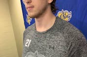  Edmonton Oil Kings captain Jake Neighbours displays a team T-shirt with the slogan, ‘Through the Storm,’ following practice at Rogers Place on Tuesday, April 19, ahead of their opening-round playoff series against the Lethbridge Hurricanes.