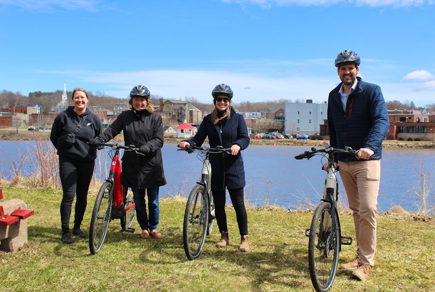 From left to right: Veronica Deno, Nancy Dicks, Rachel Mitchell and Sean Fraser after taking the town of New Glasgow's electric bikes for a spin.
