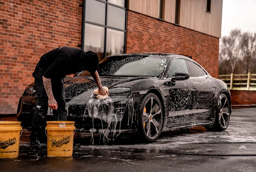 The two-bucket system for washing your car uses one bucket for exterior car soap and another with plain water for rinsing the wash-mitt before each dip back into the soapy solution. Brad Starkey photo/Unsplash