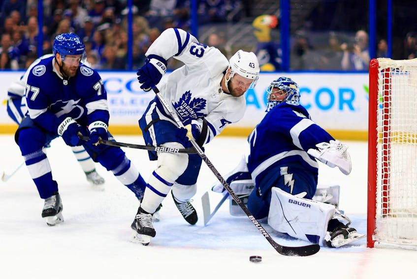 Andrei Vasilevskiy of the Tampa Bay Lightning stops a shot from Kyle Clifford of the Toronto Maple Leafs in the first period during a game  at Amalie Arena on April 21, 2022 in Tampa, Florida. 