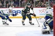 Minnesota Wild right wing Mats Zuccarello (36) is unable to convert on a scoring attempt against Vancouver Canucks goaltender Thatcher Demko (35) during the first period of an NHL hockey game Thursday, April 21, 2022, in St. Paul, Minn. 