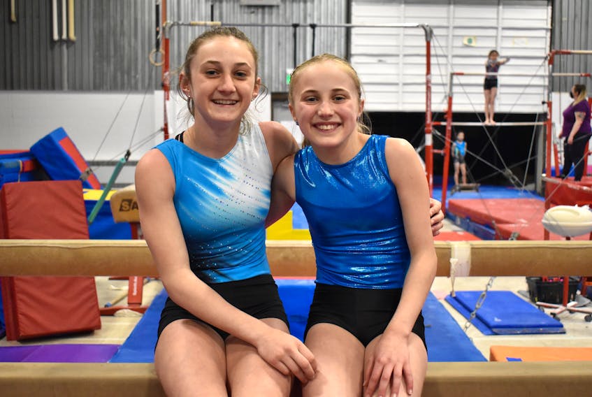 Sisters Ava MacDonald, left, and Norah MacDonald will look to secure their spot in the Atlantic Championship this weekend when they represent Cape Breton Gymnastics Academy at the provincial championships in Dartmouth this weekend. JEREMY FRASER/CAPE BRETON POST. 