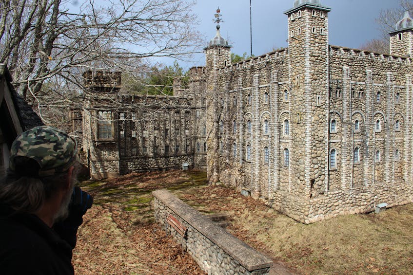 Bruce Richardson looks at the replica of the Tower of London, one of the two castles at the former Woodleigh Replicas, which he bought in August 2021.