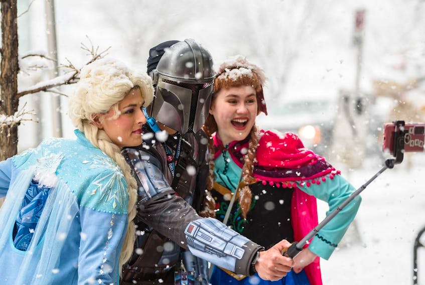  Cosplayers brave the heavy snow to participate in Calgary?s Parade of Wonders on Friday, April 22, 2022.