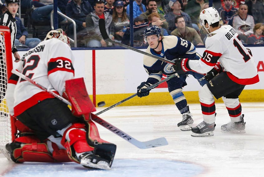 Ottawa Senators goalie Filip Gustavsson (32) makes a save on the shot of Columbus Blue Jackets right wing Carson Meyer (55) during the second period at Nationwide Arena on Friday night.

