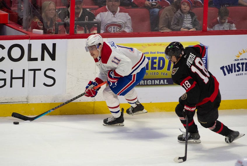 Montreal Canadiens winger Brendan Gallagher (11) is pursued by Ottawa Senators forward Tim Stutzle  on Saturday at the Canadian Tire Centre.
