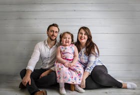 Willow Lanto and her father, Josh, left, and mother, Sandra, are travelling to Calgary, Alta., after Willow's wish to meet her family in Alberta was granted by Make-A-Wish Foundation of Canada.