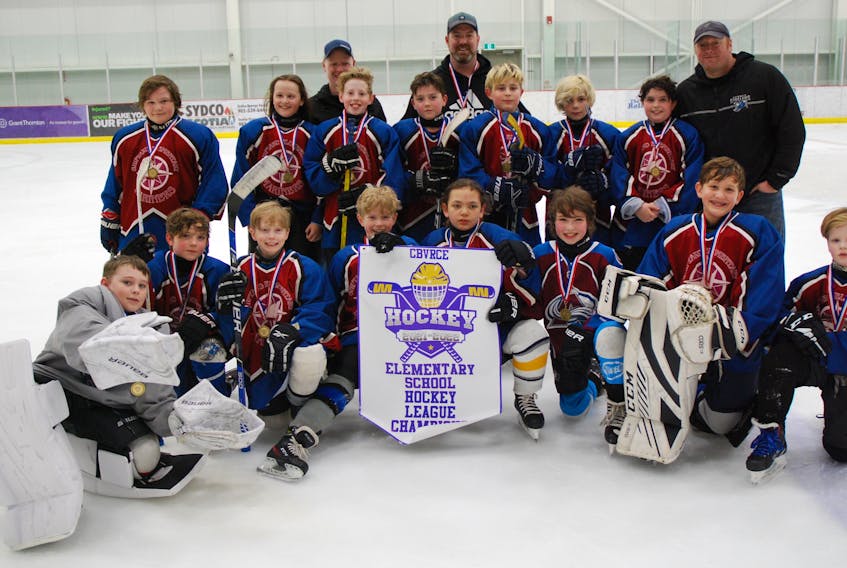 The Shipyard Sharks captured the Cape Breton-Victoria Regional Centre for Education Elementary School Hockey League championship with a 2-0 win over Brookland Blazers on April 14 in Membertou. The Sharks finished the season undefeated. In the front row from left are Liam Campbell, Aiden Carmichael, Ethan Gillis, Elliott Gillis, Shardayah Darling, Landon MacArthur, Owen Cromwell and Sam Borden. In the middle row from left are Gabe Colello, Mabella Scott, Dylan Dickson, Rowan Carmicheal, Spencer Melski, Tucker MacLeod and Spencer Lee. In the back row from left are coaches Darryn Borden, Rob Dickson and Tristan Gillis. CONTRIBUTED