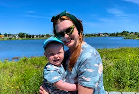 First-time mother Amber-Rae Pittman cuddles her son, Sebastian. The St. John's, NL woman says every time Sebastian coughed at first, she worried about COVID.