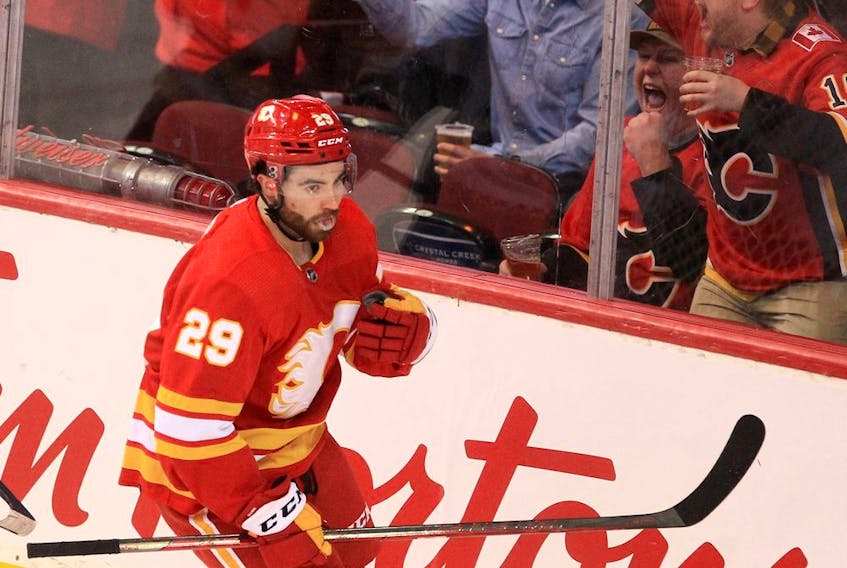 Flames forward Dillon Dube celebrates after scoring a goal during second-period NHL action against the  Arizona Coyotes at the Saddledome on April 16.