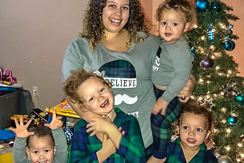 Bailee Clyke stands with her four children at Christmas. She holds Kaishawn, who is now two; Zunairah, who just four, stands at far left; Amiyah, who is seven, stands at centre; and Rozel, who is five, stands at right. CONTRIBUTED/Alana King