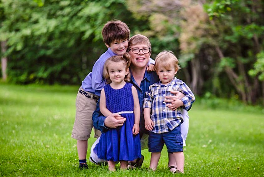 Katherine Jones, owner of the EcoBar for Sustainable Living in Sydney, pictured here with her three children. JESSICA SMITH/CAPE BRETON POST