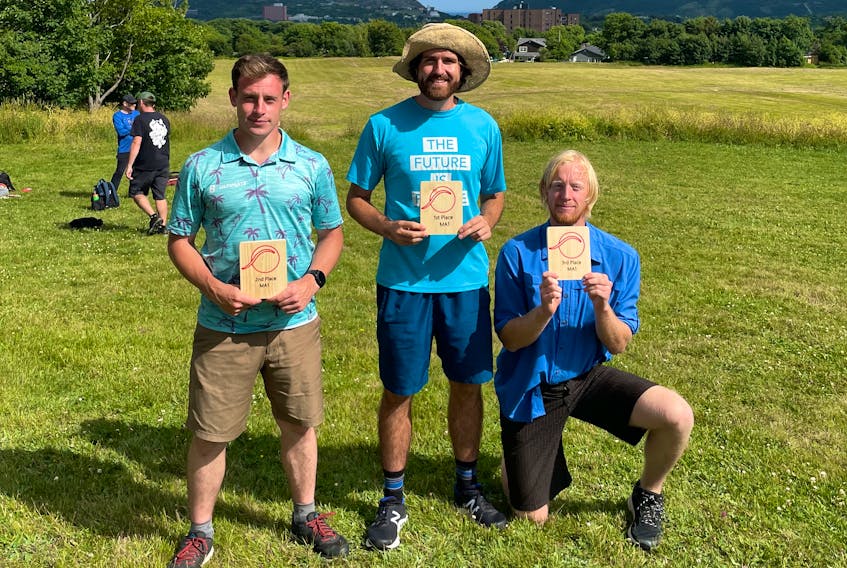 Disc Golf NL members, Nick House, president, Daviid Whitney and Willem Peters took second, first and third place respectively, in a disc golf tournament in St. John’s last year.