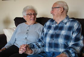 Doris and Elmer DesRoches exchange a smile in their Summerside home. The couple will have been married for 70 years on April 30.