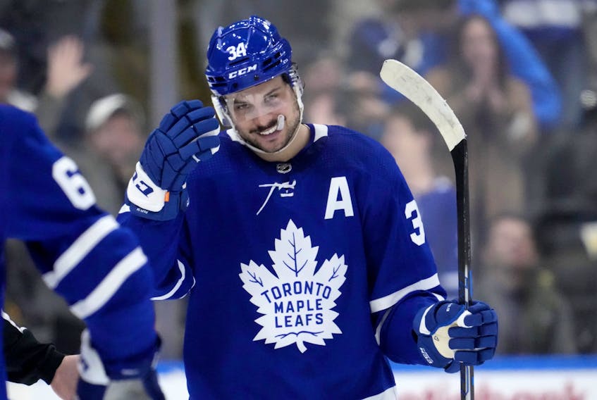 Toronto Maple Leafs centre Auston Matthews (34) celebrates after scoring his 50th goal of the season.