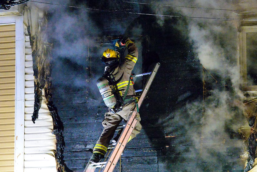 One man is dead following a downtown St. John's house fire Saturday night. Keith Gosse/The Telegram