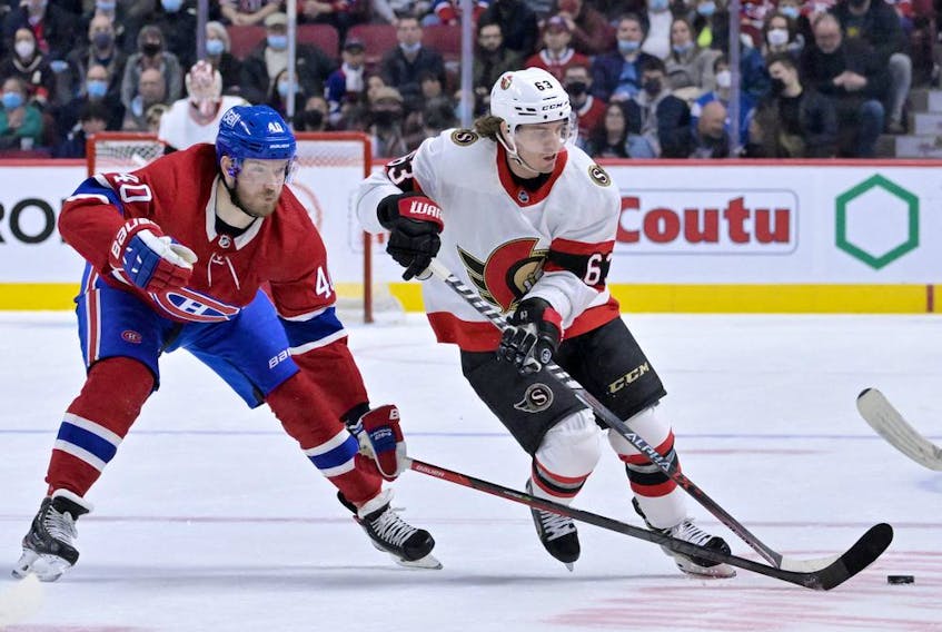 Montreal Canadiens forward Joel Armia (40) takes the puck away from Ottawa Senators forward Tyler Ennis (63) during the third period at the Bell Centre.