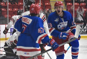 Summerside D. Alex MacDonald Ford Western Capitals forward Jacob Stewart, right, celebrates after scoring on Truro Bearcats goalie Mavrick Goyer to make it 4-1 April 30 during Game 4 of the Maritime Junior Hockey League final.