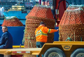 Crab pots are readied to be loaded aboard a fishing vessel on the south side of St. John’s harbour Monday afternoon as the 2022 snow crab fishing season begins.

Keith Gosse/The Telegram
