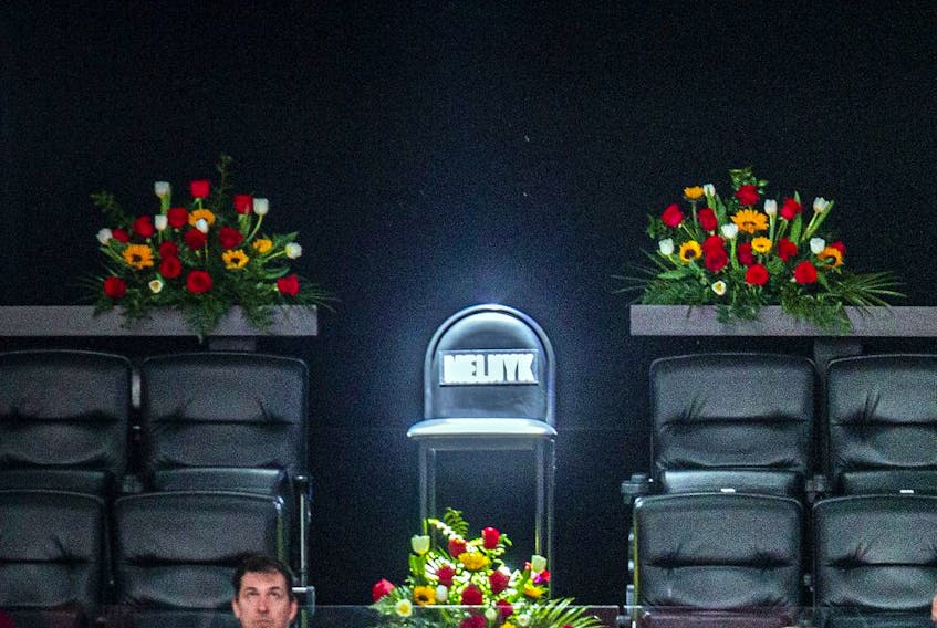  A chair in his box that sat empty, surrounded by flowers, was a special tribute for the late Eugene Melnyk.