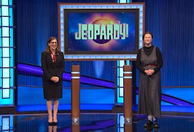 Nova Scotia contestant Mattea Roach poses for a photo with host Mayim Bialik on the set of Jeopardy! - Courtesy of Jeopardy! Productions Inc.