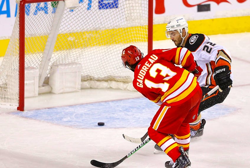 Calgary Flames Johnny Gaudreau scores on empty Anaheim Ducks net to seal the game in third period NHL action at the Scotiabank Saddledome in Calgary on Wednesday, February 16, 2022. 