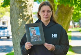 Yarmouth County resident Stacey Cook holds a photo of her son Colton Cook. She says she wants to ensure their is justice on his behalf. TINA COMEAU • TRICOUNTY VANGUARD