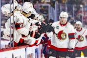 Ottawa Senators' Drake Batherson celebrates with teammates on the bench after scoring what proved to be the winning goal during third period of National Hockey League game against the Montreal Canadiens in Montreal Tuesday, April 5, 2022.